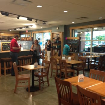 Caribou Coffee Shop - customers in a coffee shop - Desserts Near Me - Cedar Rapids, Iowa