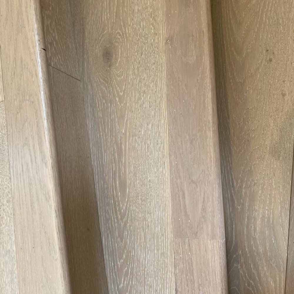 Repaired hardwood step Repaired hardwood step
