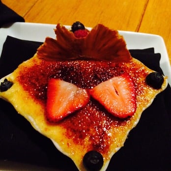 Signature Grill - Lighting is a little off on this pic of the Roasted Pineapple/Vanilla Bean Creme Brûlée. - Southern Near Me - Tucson, Arizona