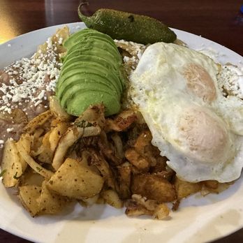 Rodeo Cafe - Chilaquiles Verdes Eggs Over-easy. Added Avocado - Cafes Near Me - Rancho Cucamonga, California Rodeo Cafe - Chilaquiles Verdes Eggs Over-easy. Added Avocado - Cafes Near Me - Rancho Cucamonga, California