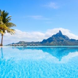 Shenieka's Fantasy Travels - Mountain Otemanu from your comfortable poolside lounge chair on the island of Bora Bora.