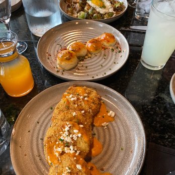Lucille's - Truffled Brussels Sprouts with Sunny Egg Chili Biscuits (4) Biscuit Benedict Fried Green Tomatoes - New American Near Me - Houston, Texas Lucille's - Truffled Brussels Sprouts with Sunny Egg Chili Biscuits (4) Biscuit Benedict Fried Green Tomatoes - New American Near Me - Houston, Texas
