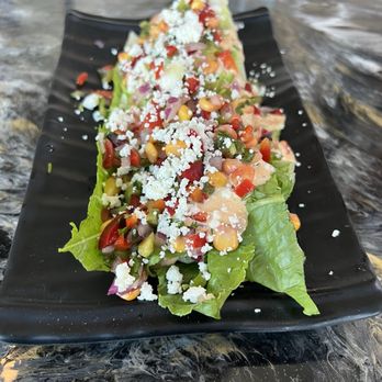 Mr. Q Restaurant - On a bed of cold romaine salad with a yummy chipotle ranch dressing. Yummy - Latin American Near Me - Atascadero, California