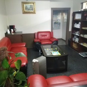 Sam's Auto Care - Sweet red leather. Retro waiting room. - Auto Repair Near Me - Plano, Texas Sam's Auto Care - Sweet red leather. Retro waiting room. - Auto Repair Near Me - Plano, Texas
