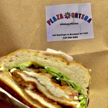 Plaza Ortega - Torta de Milanesa de Pollo Avocado, jalapeño, onions, meat, lettuce, tomato, mozzarella cheese - Mexican Near Me - Brooklyn, New York Plaza Ortega - Torta de Milanesa de Pollo Avocado, jalapeño, onions, meat, lettuce, tomato, mozzarella cheese - Mexican Near Me - Brooklyn, New York