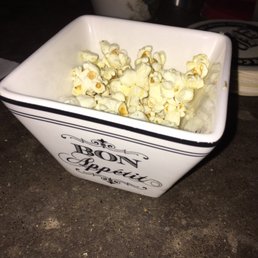 Truffle parmesan popcorn adventures. We were here having wine and the awesome bartender-waiter-sommelier handed to us. Tasty!