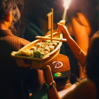 Hadiqa Lounge - "Neon Voyage" Sushi Boat - Fresh rolls delivered with a sparkler parade through the lounge. - Hookah Bars Near Me - Los Angeles, California