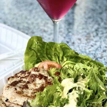 Nico's Pier 38 - fish burger with manoa mountain apple cocktail - Seafood Near Me - Honolulu, Hawaii Nico's Pier 38 - fish burger with manoa mountain apple cocktail - Seafood Near Me - Honolulu, Hawaii