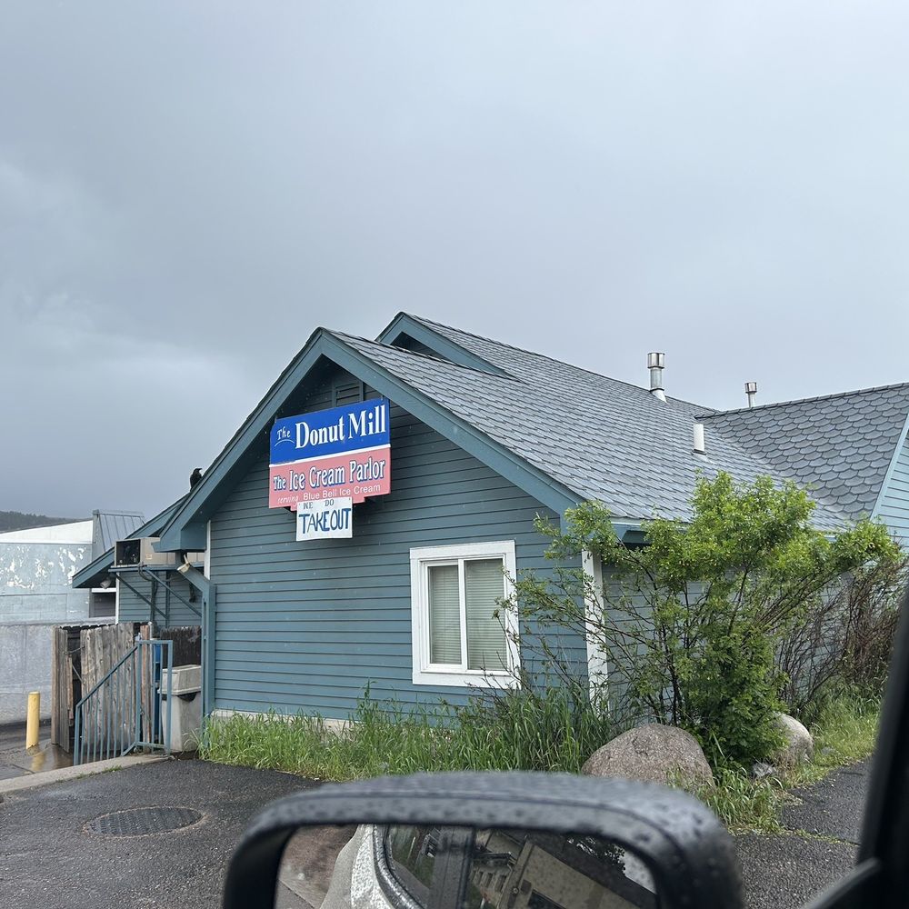 Donut Mill - a blue building with a sign for donut mill - Donuts Near Me - Woodland Park, Colorado Donut Mill - a blue building with a sign for donut mill - Donuts Near Me - Woodland Park, Colorado