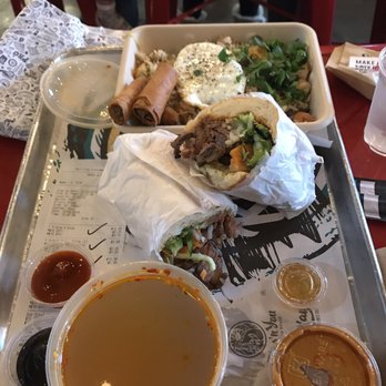Roll Play - Back to front: fried rice, steak banh mi, side of spicy oxtail pho broth - Vietnamese Near Me - Vienna, Virginia