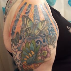 My tattoo. I had butterflies and a hummingbird previously.