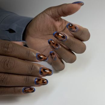 Nail Art - Tortoise shell gel design with a vibrant blue outline. Precision detailing and a glossy, durable finish. - Nail Technicians Near Me - New York, New York Nail Art - Tortoise shell gel design with a vibrant blue outline. Precision detailing and a glossy, durable finish. - Nail Technicians Near Me - New York, New York