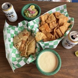 Chicken Crunch Wrap with the duo, chips guacamole and queso, paired with Modelo. Chicken Crunch Wrap with the duo, chips guacamole and queso, paired with Modelo.