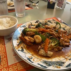 Szechuan Gardens Chinese Restaurant - Triple crown awesomeness!  And I already ate half of it!  Nice portion. Delicious!