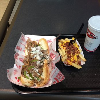 Charleys Cheesesteaks - Philly with bacon cheese fries. - Cheesesteaks Near Me - Springfield, Missouri