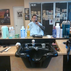 Hollywood Barber - Getting hair cut looking in the mirror.