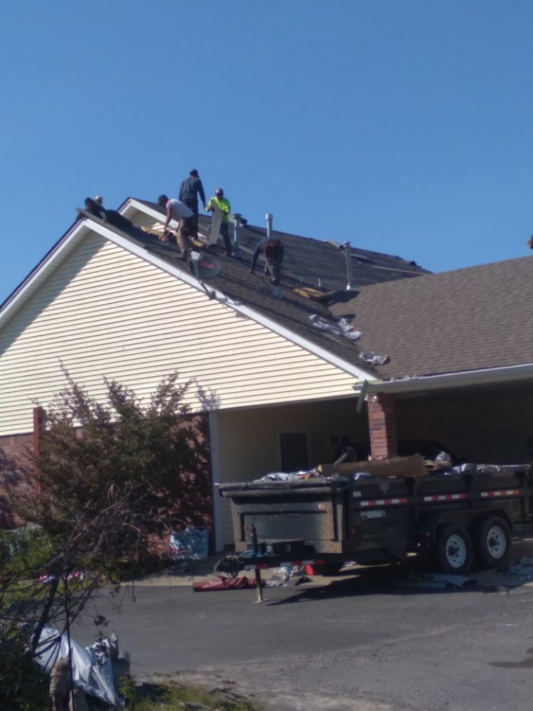 Slide of J&K Roofing Company