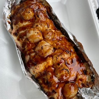 Sushi Go - a piece of meat wrapped in foil - Sushi Bars Near Me - Allen, Texas Sushi Go - a piece of meat wrapped in foil - Sushi Bars Near Me - Allen, Texas