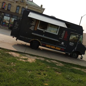 Tacos El Amigo - 1st & National, black taco truck - Tacos Near Me - Milwaukee, Wisconsin Tacos El Amigo - 1st & National, black taco truck - Tacos Near Me - Milwaukee, Wisconsin