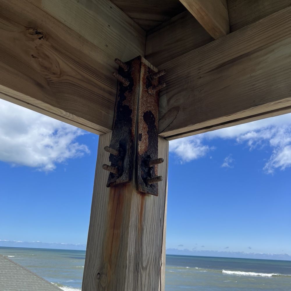 Midgett Realty - Rodanthe Office - Rust and corroded deck bracing - Property Management Near Me - Rodanthe, North Carolina Midgett Realty - Rodanthe Office - Rust and corroded deck bracing - Property Management Near Me - Rodanthe, North Carolina