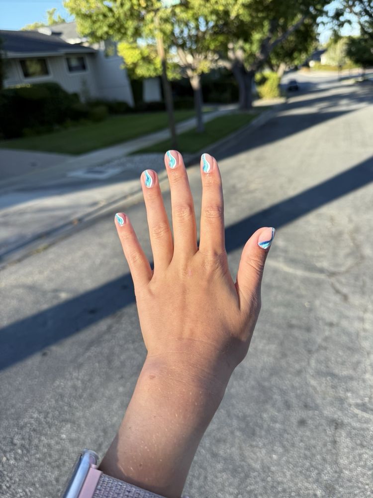 Roosevelt Nail Shop Logo