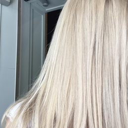 Megan has been bleaching my hair at the root (brown hair to platinum bleach out) for about a year now, and she slays every time!