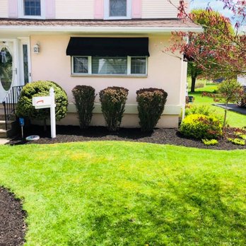 Smitty's landscaping - the front of a house - Landscaping Near Me - Auburn, New York Smitty's landscaping - the front of a house - Landscaping Near Me - Auburn, New York