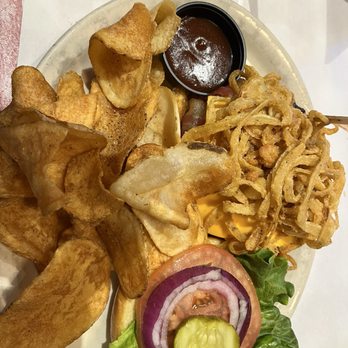 Cody's Original Roadhouse - *BBQ Bacon Burger rare with fried onion strings and the bbq sauce on the side with fresh fried potato chips. - New American Near Me - Ocala, Florida