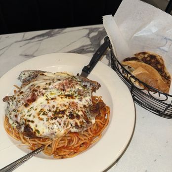 Golden Eagle Restaurant - Chicken parmigiana with spaghetti and garlic bread - Diners Near Me - Bronx, New York Golden Eagle Restaurant - Chicken parmigiana with spaghetti and garlic bread - Diners Near Me - Bronx, New York