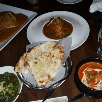 Adrak - Lamb shank (top left, hearty), lobster with prawns (top right, delicious), saag paneer (normal), and butter chicken (delicious). - Indian Near Me - Richmond Hill, Ontario Adrak - Lamb shank (top left, hearty), lobster with prawns (top right, delicious), saag paneer (normal), and butter chicken (delicious). - Indian Near Me - Richmond Hill, Ontario