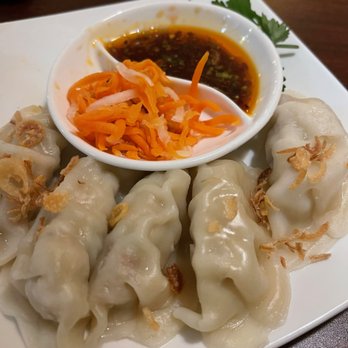 Viet's Cuisine Newnan - Chicken dumplings with dipping sauce. - Vietnamese Near Me - Newnan, Georgia Viet's Cuisine Newnan - Chicken dumplings with dipping sauce. - Vietnamese Near Me - Newnan, Georgia