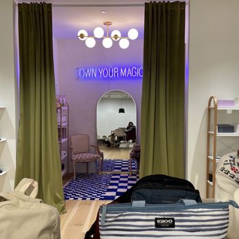Grounds - a room with a bed, a chair, and a bag - Chocolatiers & Shops Near Me - Birmingham, Alabama