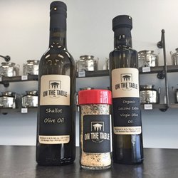 On The Table - Sample Olive Oil, Balsamic Vinegar, and Seasoning at our TASTING BAR.