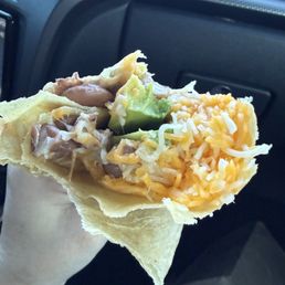 Bean and cheese burrito with avocado. Bean and cheese burrito with avocado.