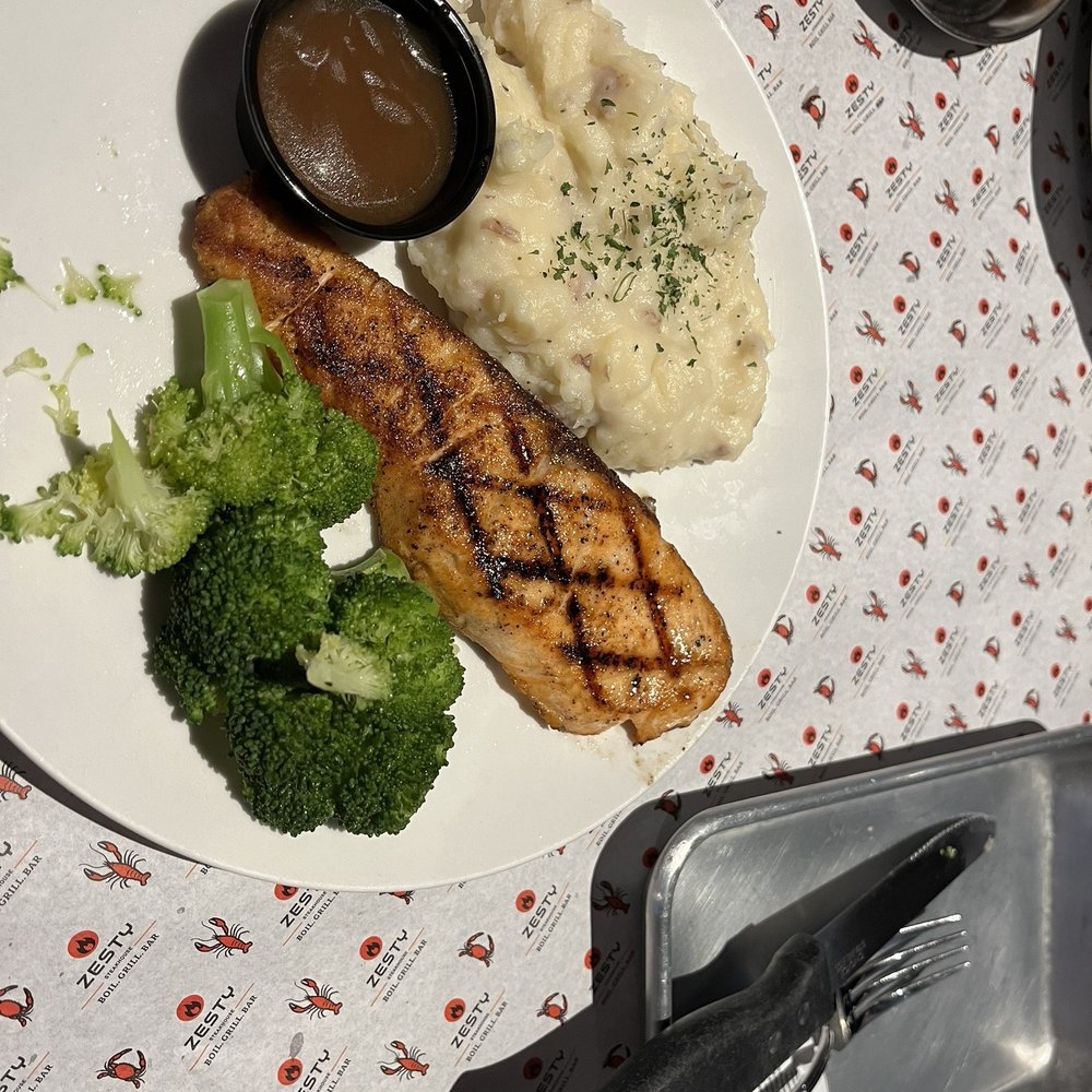 Zesty Steakhouse - After bites: HH Salmon, mashed potato, broccoli - Seafood Near Me - Lakewood, Washington Zesty Steakhouse - After bites: HH Salmon, mashed potato, broccoli - Seafood Near Me - Lakewood, Washington