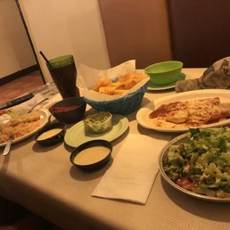 Cheese enchiladas, chimichanga meal, guacamole salad, queso dip and guacamole dip. Cheese enchiladas, chimichanga meal, guacamole salad, queso dip and guacamole dip.