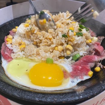 Pepper Lunch - Beef pepper rice (as it's cooking) - Japanese Near Me - Alhambra, California Pepper Lunch - Beef pepper rice (as it's cooking) - Japanese Near Me - Alhambra, California