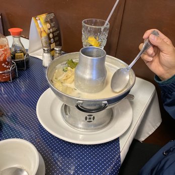 Thai Star - a person eating a bowl of soup - Thai Near Me - Merced, California