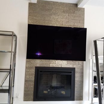 Kim’s Maintenance - Fireplace remodel (new tiles, tv mounting) after - Handyman Near Me Kim’s Maintenance - Fireplace remodel (new tiles, tv mounting) after - Handyman Near Me