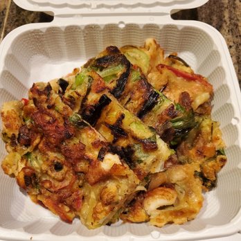 Stone Korean Restaurant - Seafood Pancake. My husband really likes it, and orders it over and over again. - Korean Near Me - Redmond, Washington Stone Korean Restaurant - Seafood Pancake. My husband really likes it, and orders it over and over again. - Korean Near Me - Redmond, Washington