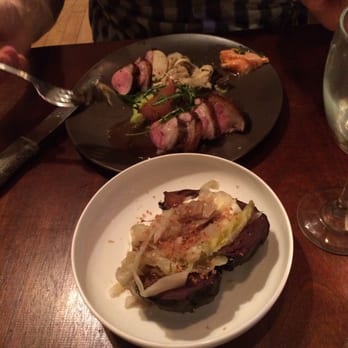 Helm - Lamb in the back and cabbage cabbage yogurt in the front - New American Near Me - Philadelphia, Pennsylvania Helm - Lamb in the back and cabbage cabbage yogurt in the front - New American Near Me - Philadelphia, Pennsylvania