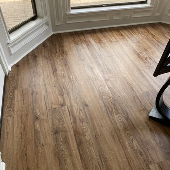 Peartree Construction & Development - a hardwood floor in a corner - General Contractors Near Me