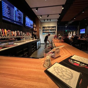 Heights Draft Room - a man working on his skateboard - Beer Bar Near Me - La Vista, Nebraska Heights Draft Room - a man working on his skateboard - Beer Bar Near Me - La Vista, Nebraska
