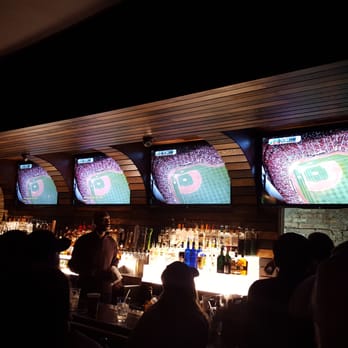 Barrelman Tavern - 4 seen televisions  & 1 on the side. - Sports Bars Near Me - Chicago, Illinois