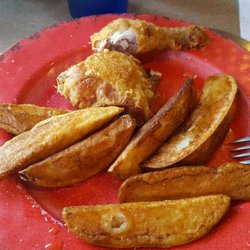 2 pc.Broasted Chicken lightly breaded comes with fries or fresh Potato wedges. Great.