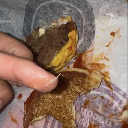 Almost finished my double cheese burger and bit into a piece of SHARP metal like piece...will never eat mcds again!!