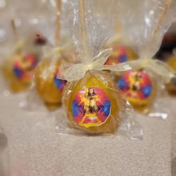 Innovative Sweets - Gold Wonder Woman Themed candy apples