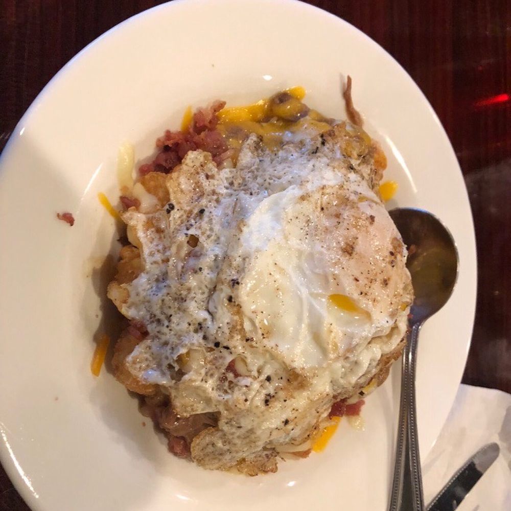 West End Grill - Tater tots smothered with pot roast and a fried egg - New American Near Me - Huntsville, Alabama West End Grill - Tater tots smothered with pot roast and a fried egg - New American Near Me - Huntsville, Alabama