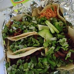 El Rinconcito Latino - 5 tacos special and lime Jarritos. 2 pastor, 1 chicken, 1 cabeza, 1 I forgot what I ordered
