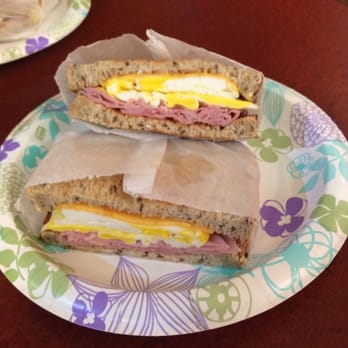 West Wing Cafe - Ham, egg, and cheese breakfast sandwich on multigrain bread. - Delis Near Me - Washington, DC, District of Columbia West Wing Cafe - Ham, egg, and cheese breakfast sandwich on multigrain bread. - Delis Near Me - Washington, DC, District of Columbia